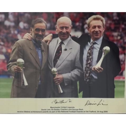 1682 - A framed picture from 20/08/200 of George Best, Sir Bobby Charlton & Denis Law receiving lifetime aw... 