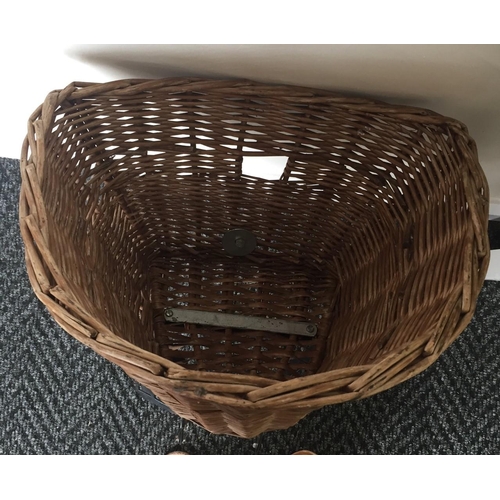 709R - A vintage wicker basket, with bracket, for the front of a bicycle