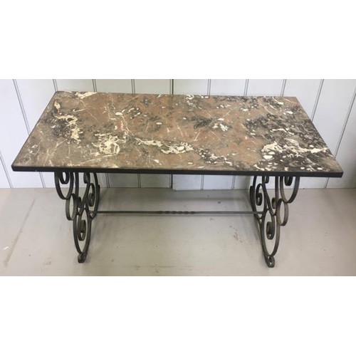 20 - A marble-topped coffee table, supported by wrought iron, scrolled legs. Dimensions(cm) H53, W93, D47... 