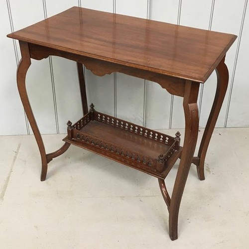 21C - An Edwardian hall table, with stretchered shelf support. Dimensions(cm) H69, W72, D47.