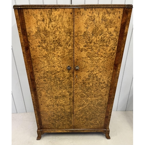 58 - A gentleman's burr walnut double wardrobe.
Dimensions(cm): H153 W92 D54