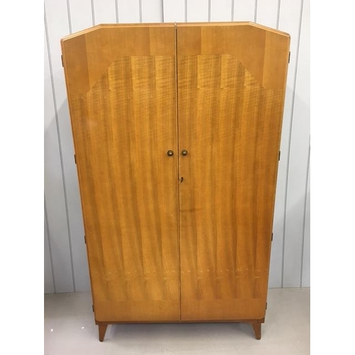 64 - A mid-century gentleman's double wardrobe. Two hanging rails & three internal shelved compartments. ... 