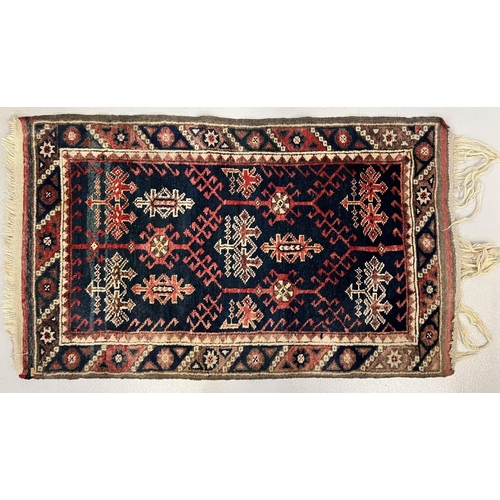 195 - A 100% wool, Turkish traditional patterned rug. 135cm x 78cm.