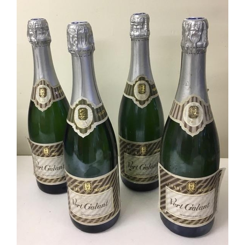 Four unopened bottles of French sparkling wine 'Vert Galant'.