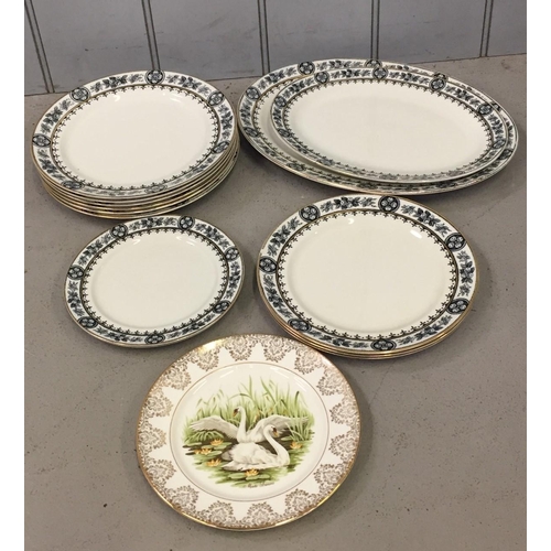 603 - An incomplete vintage dinner service. Includes two serving dishes, six dinner plates & five side pla... 