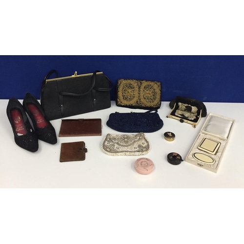 658 - A selection of vintage ladies items. Includes handbags (one handmade in India), purses, wallets (one... 