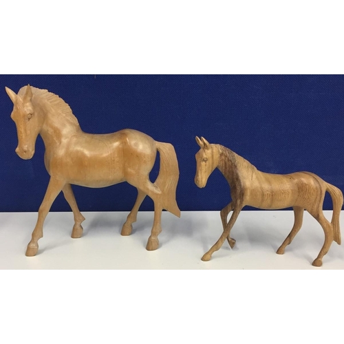 661D - Carved mother & foal figures. Height 21cm & 15cm.