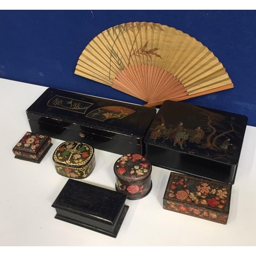 661J - A collection of decorative boxes. Includes two Japanese lacquered boxes, four trinket boxes, one ebo... 