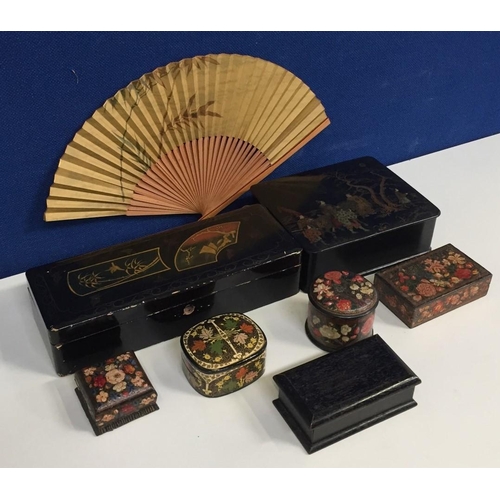 661J - A collection of decorative boxes. Includes two Japanese lacquered boxes, four trinket boxes, one ebo... 