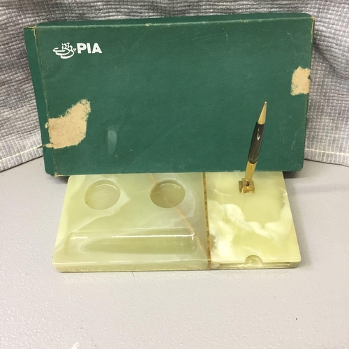 665 - A vintage onyx desk tidy, by PIA, with original box. Pen appears unused.