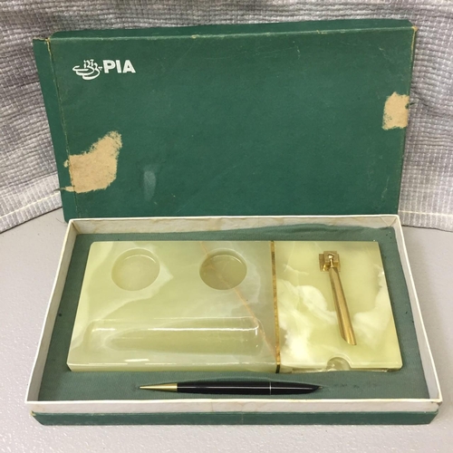 665 - A vintage onyx desk tidy, by PIA, with original box. Pen appears unused.