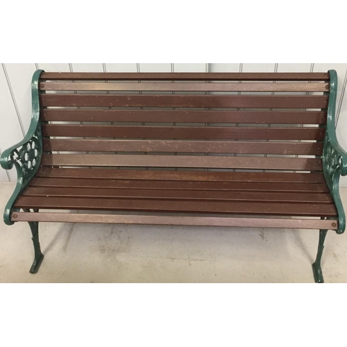 703 - A cast iron framed garden bench. Dimensions(cm) H70(38 to seat), W128, D60.