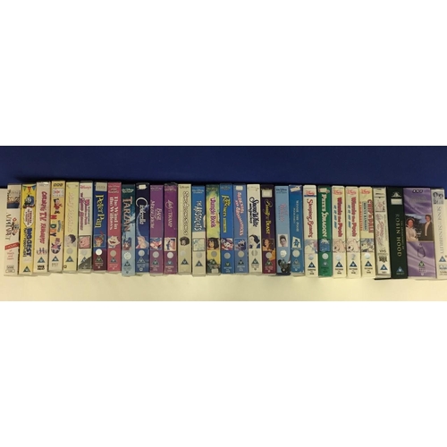 719 - A selection of original Disney & other children's videos, along with BBC Pride and Prejudice, Sense,... 