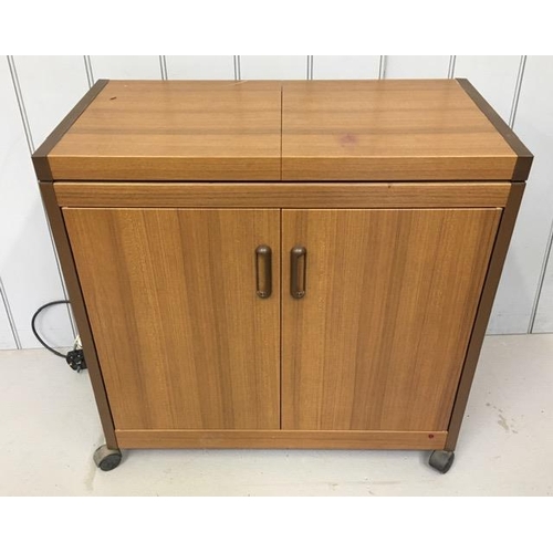 836 - An electric hostess trolley. Dimensions(cm) H71, W72, D39.