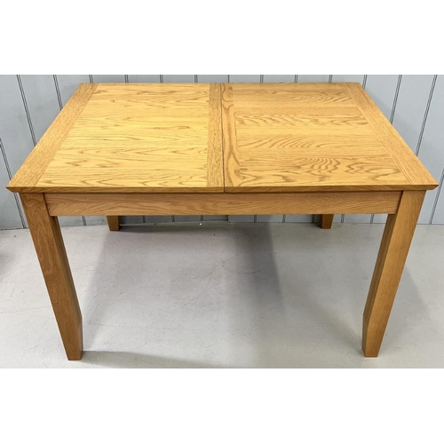 16 - A modern, extending dining table. Dimensions(cm) H74, W120/150, D90.