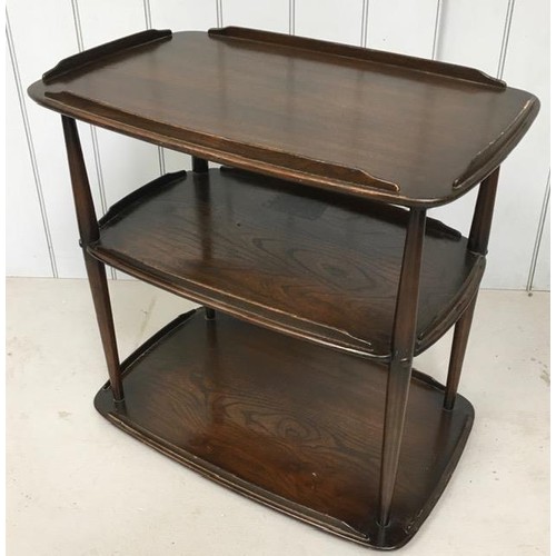 21B - An Ercol, dark elm three-tier trolley (without castors).
Dimensions(cm) H69, W72, D47.