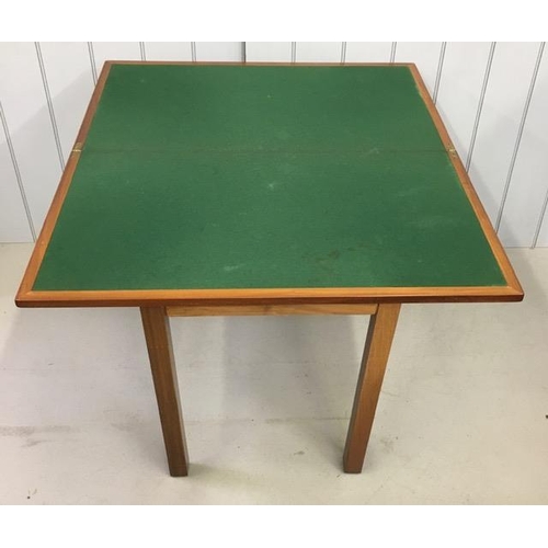 30 - A folding, green baized, card-table. Dimensions(cm) H72, W92, D51/102.