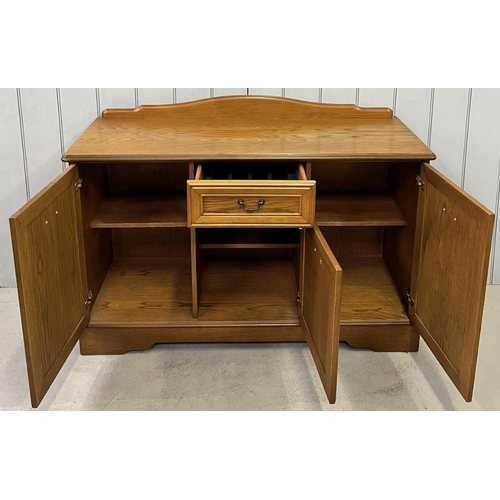 49 - A vintage sideboard, with three cupboards & cutlery drawer. Dimensions(cm) H77, W122, D45.