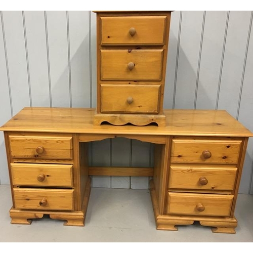 75 - A solid pine dressing table, with matching bedside chest of three drawers. Dimensions(cm) H70/63, W1... 