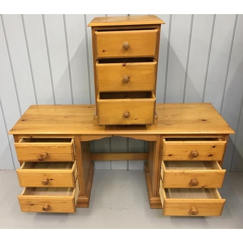 75 - A solid pine dressing table, with matching bedside chest of three drawers. Dimensions(cm) H70/63, W1... 