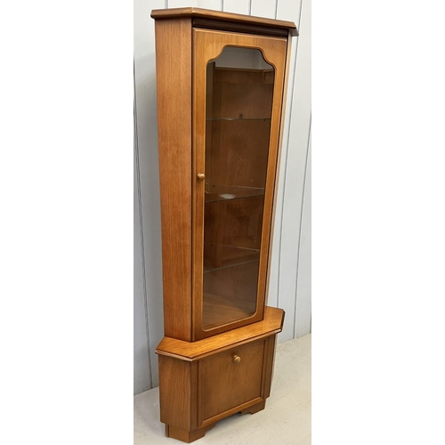 117 - A mid-century corner display cabinet, by Rossmore Furniture.
Dimensions(cm) H188, W72, D50