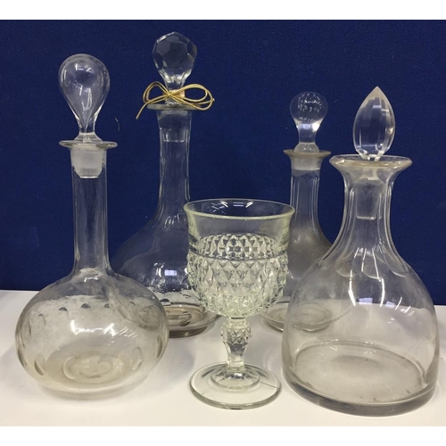 206 - Four vintage decanters & a crystal goblet.