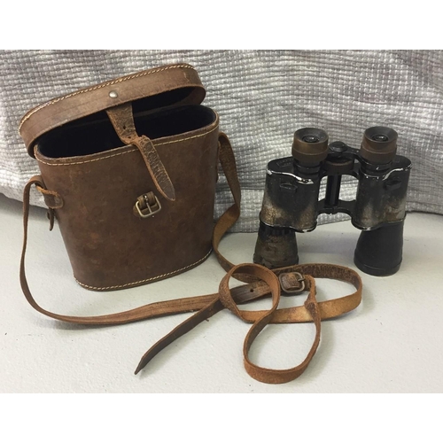 278A - A pair of Deraisme Paris Lumdop 12 x 35 binoculars, with leather case.