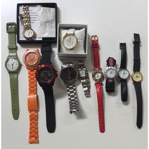 392 - A selection of eleven vintage watches. Includes a boxed Citizen watch with original receipt (working... 