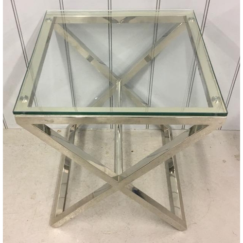 12 - A contemporary, designer chrome/glass coffee table. Dimensions(cm) H45, W45, D55.