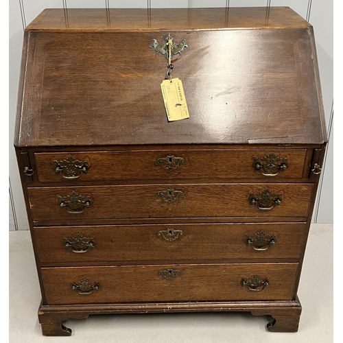 111A - A Georgian, oak bureau.
Fall-front. Fitted interior over four drawers. Original brass handles. Key p... 