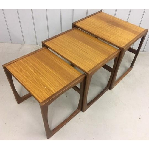 126 - A mid-century, G-Plan 'Astro' nest of three tables. Largest dimensions(cm) H48, W54, D43.