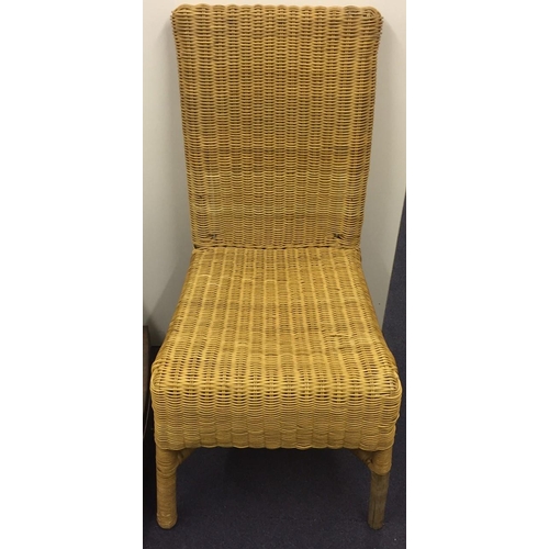 141 - A woven wicker chair. Dimensions(cm) H92(46 to seat), W49, D56.