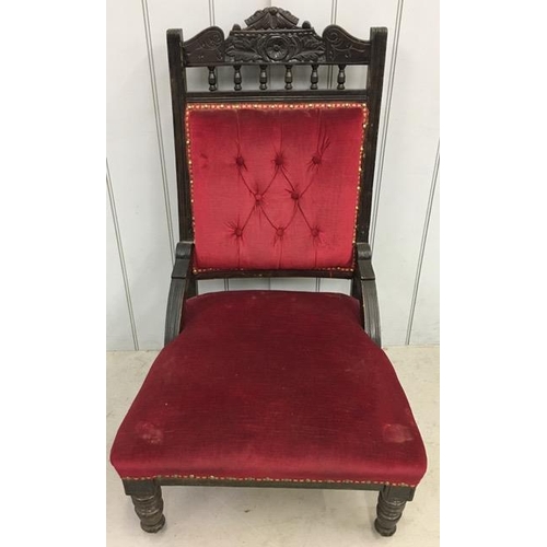 145D - An Edwardian library chair, upholstered in red fabric. Dimensions(cm) H101(34 to seat), W64, D69.