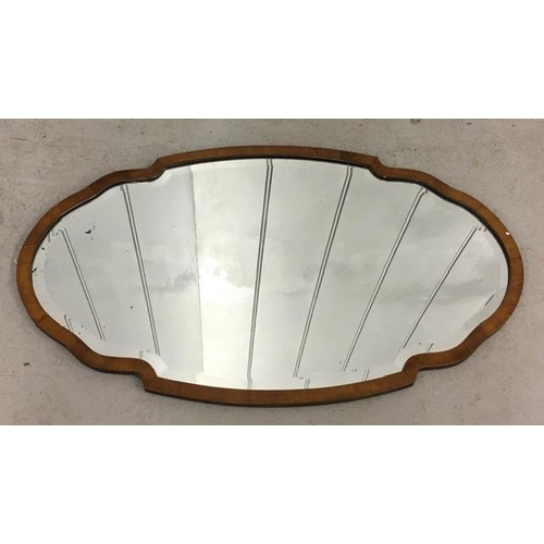 175 - A vintage, bevelled-edged mirror. 42cm x 71cm.