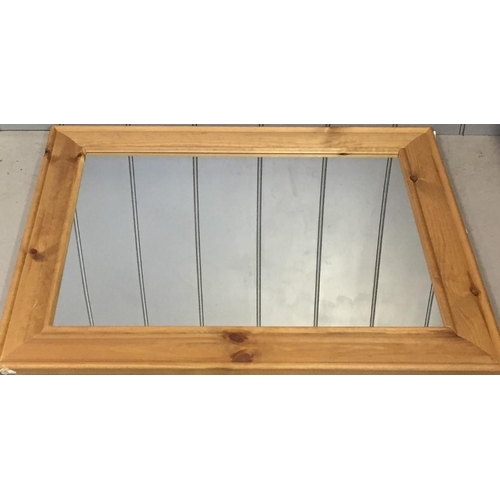 178 - A pine framed mirror. 66cm x 87cm.