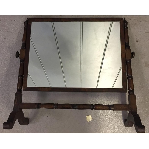 179 - Two vintage mirrors. An overmantle, oak framed, bevelled edged mirror (57cm x 81cm), together with a... 