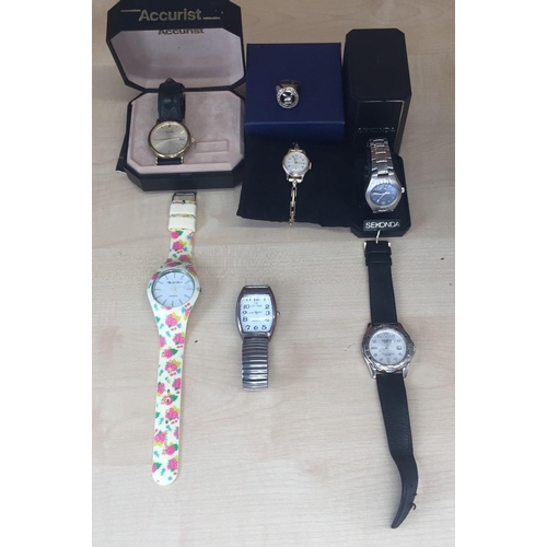 391 - A collection of six ladies & gents watches, together with a white metal dress ring. Includes Sekonda... 