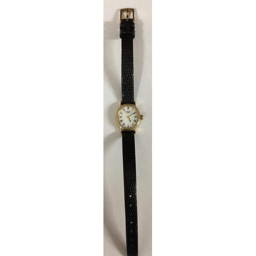 396 - A ladies watch, by Rotary. Model LS00471. Mother of pearl face, with black leather strap.