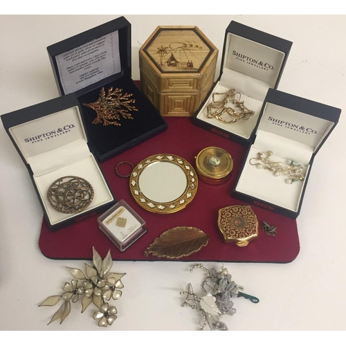 414 - A selection of earrings, brooches & trinket boxes.