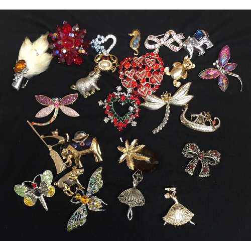 417A - A collection of 24 brooches. Includes hearts, dancers, bows, elephants, pigs etc.