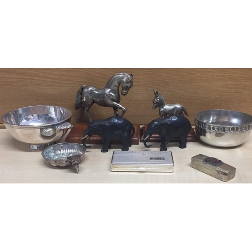 428 - A mixed lot of ornamental metalware. A selection of silver plated items including horse & donkey fig... 