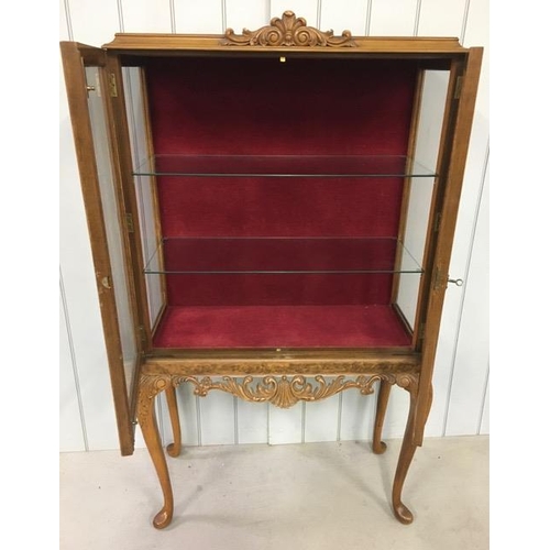 36 - A Queen Anne style, burr walnut/glazed, display cabinet. Two internal glass shelves. Key present.  D... 