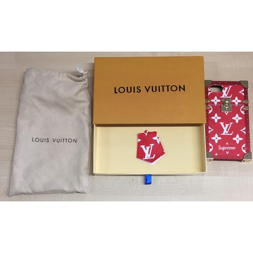 660 - A boxed Louis Vuitton Supreme mobile phone case, with dust cover.