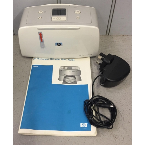 796 - An HP Photosmart 320 series printer, with user guide. Untested.