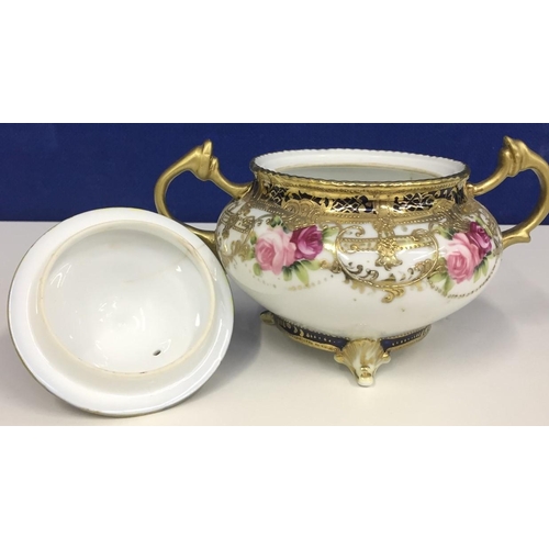 534M - Six items of Noritake ceramics. Includes a matching cup/saucer/pitcher with a butterfly design, two ... 