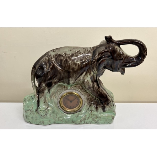 550 - A 1950's, ceramic Elephant figurine with integrated clock, made in Belgium by 'Thurin'. 
Dimensions(... 