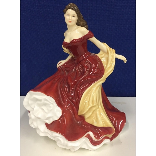 554 - A Royal Doulton Pretty Ladies 'Winter Ball' figurine (ref. HN5466). height 21cm.