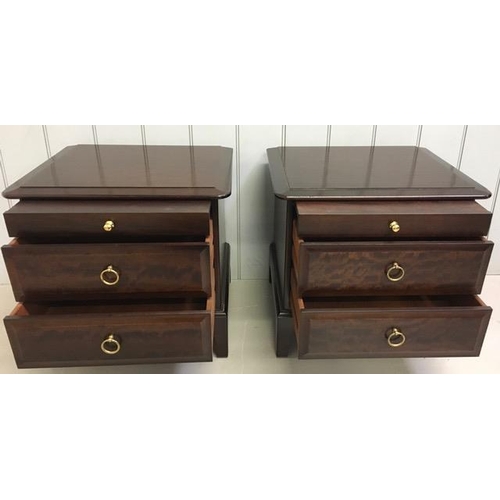 55 - A pair of Stag 'Minstrel' bedside chests of three drawers. Dimensions9cm) H50, W53, D47.