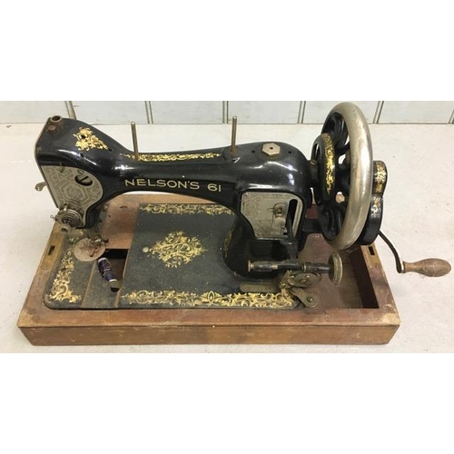 667 - A Nelson's 61 antique sewing machine, with case. Serial no. X1114.