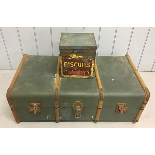 709 - A vintage trunk, together with an early Cadbury's Lincoln biscuit tin.